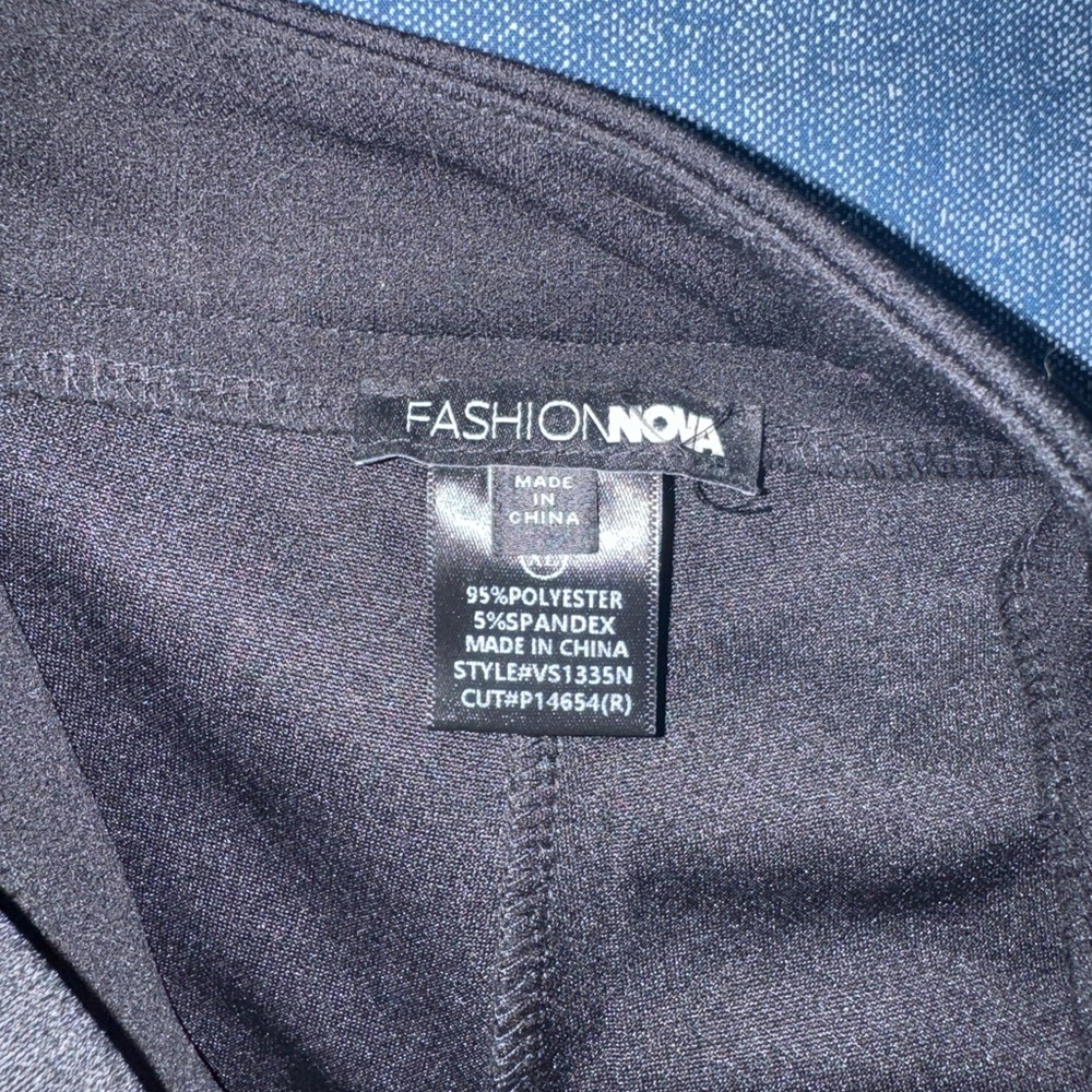 Fashion Nova Black Asymmetric Pleated Mini Skirt with Buckle Detail - Picture 7 of 8